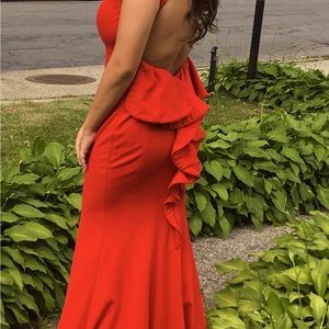 Red, backless evening gown